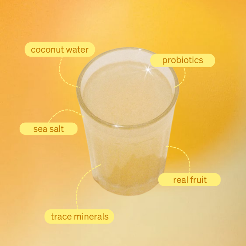 Clevr SuperTea in a glass with benefit callouts: coconut water, probiotics, sea salt, real fruit, and trace minerals. 