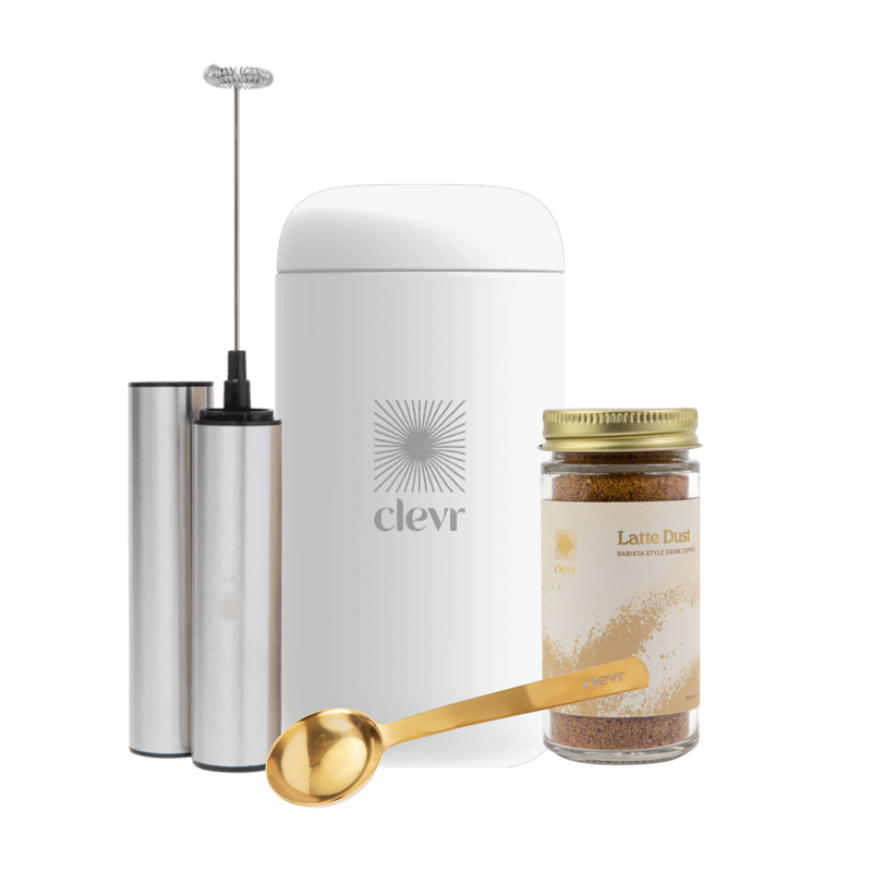 Kit accessories: a thermos, a frother, latte dust, and a golden scoop.