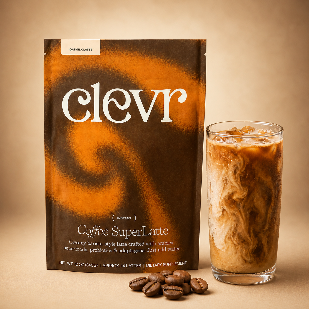 A stand-up pouch of Clevr Coffee SuperLatte stands next to a tall glass filled with iced latte, with a few coffee beans in front, on a warm beige background.