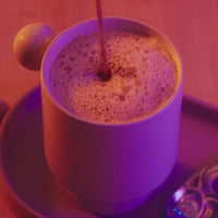 Clevr SuperLatte pouring into a mug
